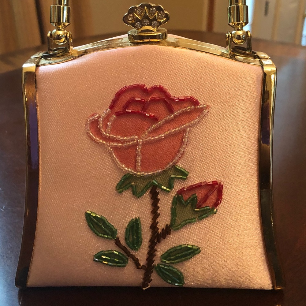 Pink satin clutch with rose